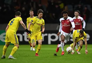 BATE Borisov V Arsenal 2018-19 Prints: Arsenal's Alex Iwobi vs. Dmitri Baga: Europa League Clash