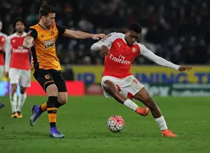 15/16 Hull City V Arsenal FA Cup Prints: Arsenal's Alex Iwobi vs. Hull's Ryan Taylor: FA Cup Fifth Round Replay Battle