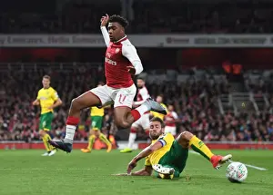 Arsenal V Norwich - Carabo Cup 4th Round 2017-18 Prints: Arsenal's Alex Iwobi vs Norwich's Ivo Pinto: A Carabao Cup Showdown