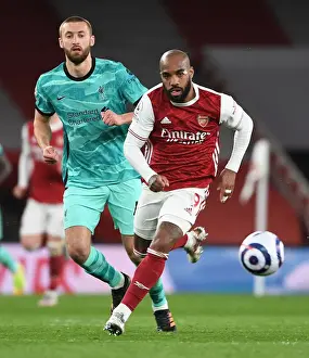 Arsenal's Alex Lacazette Breaks Past Liverpool's Nathaniel Phillips in Empty Emirates Stadium - Arsenal v Liverpool, 2021-22 Premier League