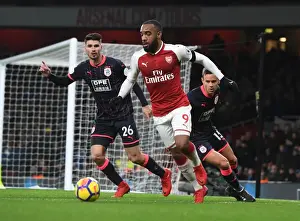 Arsenal V Huddersfield Town 2017-18 Prints: Arsenal's Alex Lacazette Clashes with Huddersfield's Schindler and Lowe