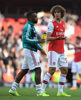 Arsenal's Alex Lacazette and David Luiz Celebrate after Arsenal v Tottenham Hotspur Premier League Match, 2019-20