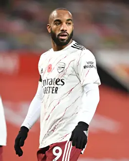 Arsenal's Alex Lacazette at Manchester United's Old Trafford: 2020-21 Premier League Match Amid Coronavirus Restrictions
