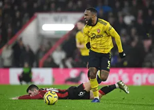 Arsenal's Alex Lacazette Outmaneuvers Bournemouth's Lewis Cook in Premier League Clash (AFC Bournemouth v Arsenal 2019-20)