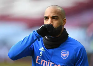 Arsenal's Alex Lacazette Prepares for Aston Villa Clash in Empty Villa Park (Aston Villa vs Arsenal, 2021-22 Premier League)