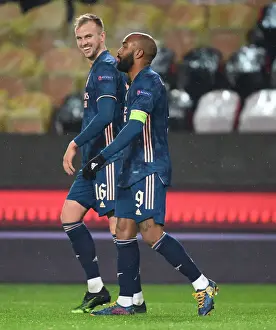Arsenal's Alex Lacazette and Rob Holding Celebrate Goals in Empty Eden Arena: Slavia Prague vs Arsenal, UEFA Europa League Quarterfinal