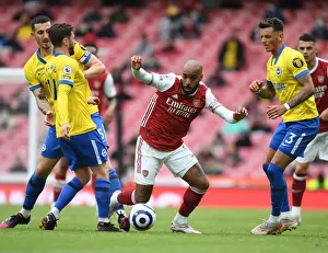 Arsenal's Alex Lacazette Scores Past Brighton's Lallana and White in 2020-21 Premier League Clash