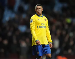 Aston Villa V Arsenal 2013-14 Prints: Arsenal's Alex Oxlade-Chamberlain in Action against Aston Villa (Premier League 2013-14)
