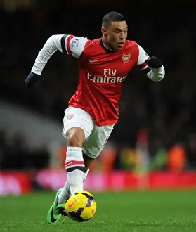 Arsenal V Manchester United 2013-14 Prints: Arsenal's Alex Oxlade-Chamberlain in Action Against Manchester United (2013-14)