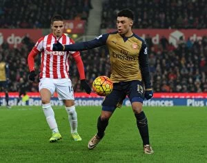 Stoke City v Arsenal 2015-16 Collection: Arsenal's Alex Oxlade-Chamberlain in Action against Stoke City (Premier League 2015-16)