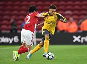 Middlesbrough V Arsenal 2016-17 Prints: Arsenal's Alex Oxlade-Chamberlain Clashes with Middlesbrough's Fabio in Premier League Showdown