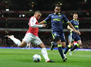 Arsenal V Wigan Athletic 2011-12 Prints: Arsenal's Alex Oxlade-Chamberlain Clashes with Wigan's Jean Beausejour during the Premier League Match
