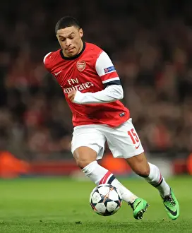 Arsenal V Bayern Munich 2013-14 Prints: Arsenal's Alex Oxlade-Chamberlain Faces Off Against Bayern Munich in the UEFA Champions League