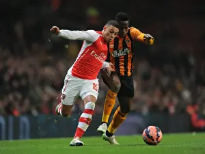 Arsenal's Alex Oxlade-Chamberlain Faces Off Against Hull City's Maynor Figueroa in FA Cup Clash