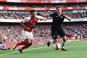 Arsenal V Seville - Emirates Cup 2017-18 Prints: Arsenal's Alex Oxlade-Chamberlain Faces Off Against Sevilla's Sebastien Corchia at the Emirates Cup