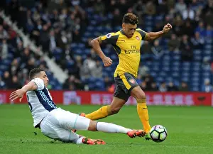 West Bromwich Albion V Arsenal 2016-17 Prints: Arsenal's Alex Oxlade-Chamberlain Faces Off Against West Bromwich Albion's Jake Livermore