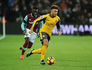 Olympic Stadium Prints: Arsenal's Alex Oxlade-Chamberlain Faces Off Against West Ham in Premier League Showdown