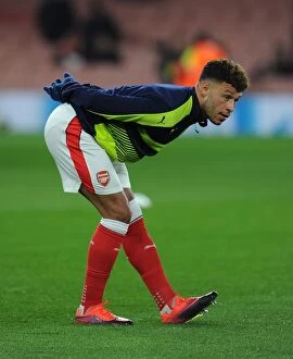 Images Dated 23rd November 2016: Arsenal's Alex Oxlade-Chamberlain Faces Paris Saint-Germain in Champions League Showdown at