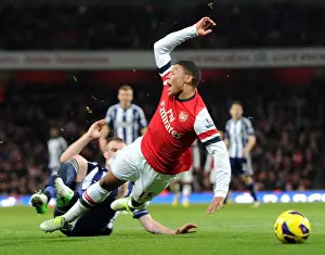 Arsenal V West Bromwich Albion 2012-13 Prints: Arsenal's Alex Oxlade-Chamberlain Fouled by Chris Brunt in 2012-13 Arsenal v West Bromwich Albion Match