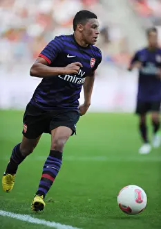 Cologne V Arsenal 2012-13 Prints: Arsenal's Alex Oxlade-Chamberlain Goes Head-to-Head with FC Cologne in 2012 Pre-Season Clash