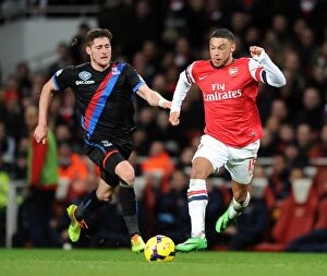 Crystal Palace Collection: Arsenal's Alex Oxlade-Chamberlain Outmaneuvers Crystal Palace's Joel Ward