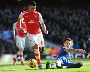 Arsenal Everton 2014-15 Prints: Arsenal's Alex Oxlade-Chamberlain Outmaneuvers Everton's Muhamed Besic