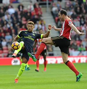 Sunderland V Arsenal 2016-17 Prints: Arsenal's Alex Oxlade-Chamberlain Outmaneuvers Sunderland's John O'Shea