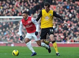 Arsenal v Blackburn Rovers 2011-12 Collection: Arsenal's Alex Oxlade-Chamberlain Outpaces Blackburn's Radoslav Petrovic
