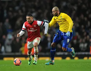 Arsenal's Alex Oxlade-Chamberlain Outpaces Coventry's Leon Clarke in FA Cup Clash