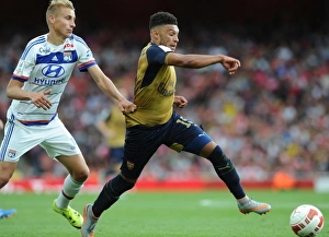Arsenal's Alex Oxlade-Chamberlain vs. Olympique Lyonnais Ulrich Jennsen: A Clash at the Emirates Cup 2015/16