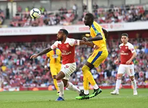 Arsenal V Crystal Palace 2018-19 Prints: Arsenal's Alexandre Lacazette Faces Off Against Cheikhou Kouyate in Intense Arsenal v Crystal Palace Clash