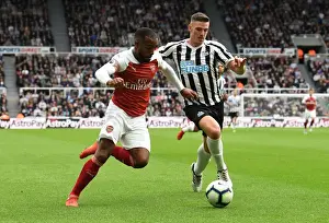 Newcastle United V Arsenal 2018-19 Prints: Arsenal's Alexandre Lacazette Faces Off Against Newcastle's Ciaran Clark in Premier League Clash
