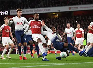 Arsenal's Alexandre Lacazette Faces Off Against Tottenham's Danny Rose in Carabao Cup Quarterfinal Showdown