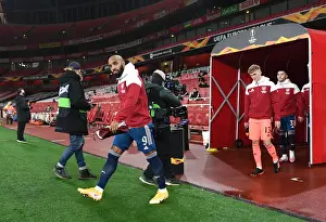 Arsenal V SK Rapid Wien 2020-21 Prints: Arsenal's Alexandre Lacazette Leads Team Out Against Rapid Wien in Europa League
