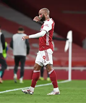 Arsenal's Alexis Lacazette Suffers Injury in Empty Emirates Stadium During Arsenal v Liverpool Premier League Clash (2020-21)