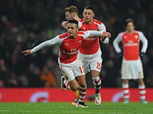 Images Dated 4th January 2015: Arsenal's Alexis Sanchez and Alex Oxlade-Chamberlain Celebrate Goals Against Hull City in FA Cup