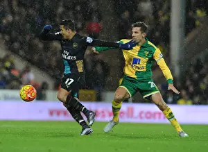 Norwich City V Arsenal 2015-16 Prints: Arsenal's Alexis Sanchez Battles Norwich's Gary O'Neil in Intense Premier League Showdown