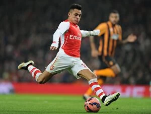 Images Dated 4th January 2015: Arsenal's Alexis Sanchez in FA Cup Action against Hull City (2014-15)