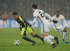 FC Basel V Arsenal 2016-17 Prints: Arsenal's Alexis Sanchez Faces Off Against Basel's Mohamed Elyounoussi