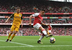 Arsenal V Brighton And Hove Albion 2017-18 Prints: Arsenal's Alexis Sanchez Faces Off Against Brighton's Christian Gross in Premier League Showdown