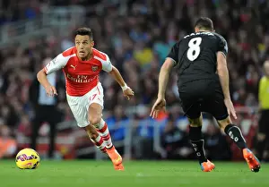 Arsenal V Burnley 2014/15 Prints: Arsenal's Alexis Sanchez Faces Off Against Burnley's Dean Marney in Premier League Showdown