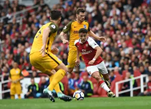 Arsenal V Brighton And Hove Albion 2017-18 Prints: Arsenal's Alexis Sanchez Faces Off Against Christian Gross in Premier League Clash vs Brighton & Hove Albion