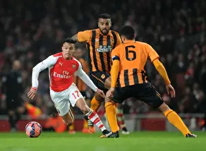 Arsenal's Alexis Sanchez Faces Off Against Hull City's Tom Huddlestone and Curtis Davies in FA Cup Clash