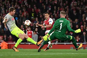 Arsenal V FC Köln 2017-18 Prints: Arsenal's Alexis Sanchez Faces Off Against Marco Hoger and Timo Horn of FC Köln in Europa League Clash