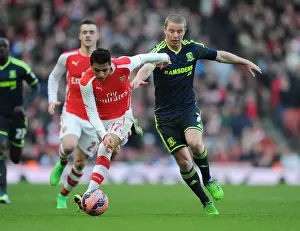 Arsenal V Middlesbrough - FA Cup 2014-15 Prints: Arsenal's Alexis Sanchez Faces Off Against Middlesbrough's Grant Leadbitter in FA Cup Clash