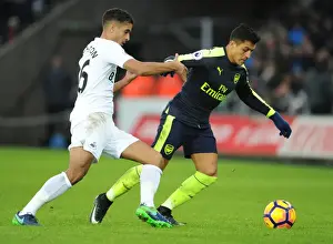 Arsenal's Alexis Sanchez Faces Off Against Swansea's Kyle Naughton in Premier League Clash