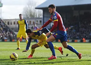 Arsenal's Alexis Sanchez Fends Off Crystal Palace's Joel Ward During Premier League Clash