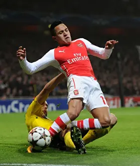 Arsenal V Borussia Dortmund 2014-15 Prints: Arsenal's Alexis Sanchez Fouled by Neven Subotic in Champions League Clash vs Borussia Dortmund
