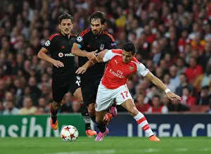 Arsenal's Alexis Sanchez Fouls Olcay Sahan in 2014 UEFA Champions League Qualifier