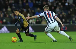 West Bromwich Albion V Arsenal 2015-16 Prints: Arsenal's Alexis Sanchez Goes Head-to-Head with Chris Brunt in Premier League Clash: West Bromwich Albion vs